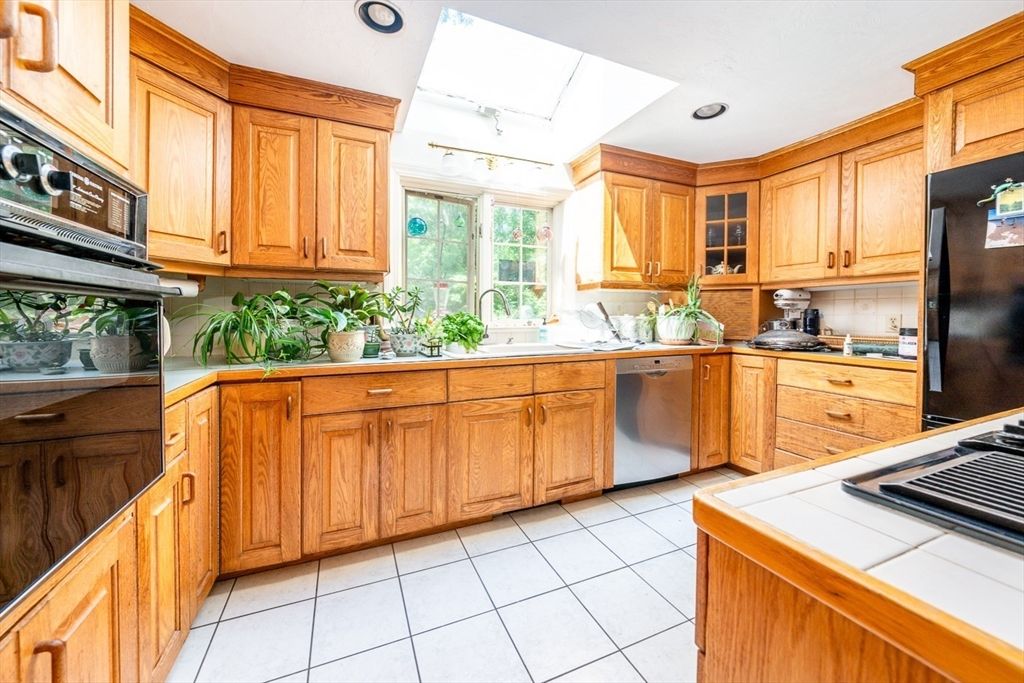 Interior, Kitchen, Recessed Lighting, Stainless Steel Appliances, Tile Countertops
