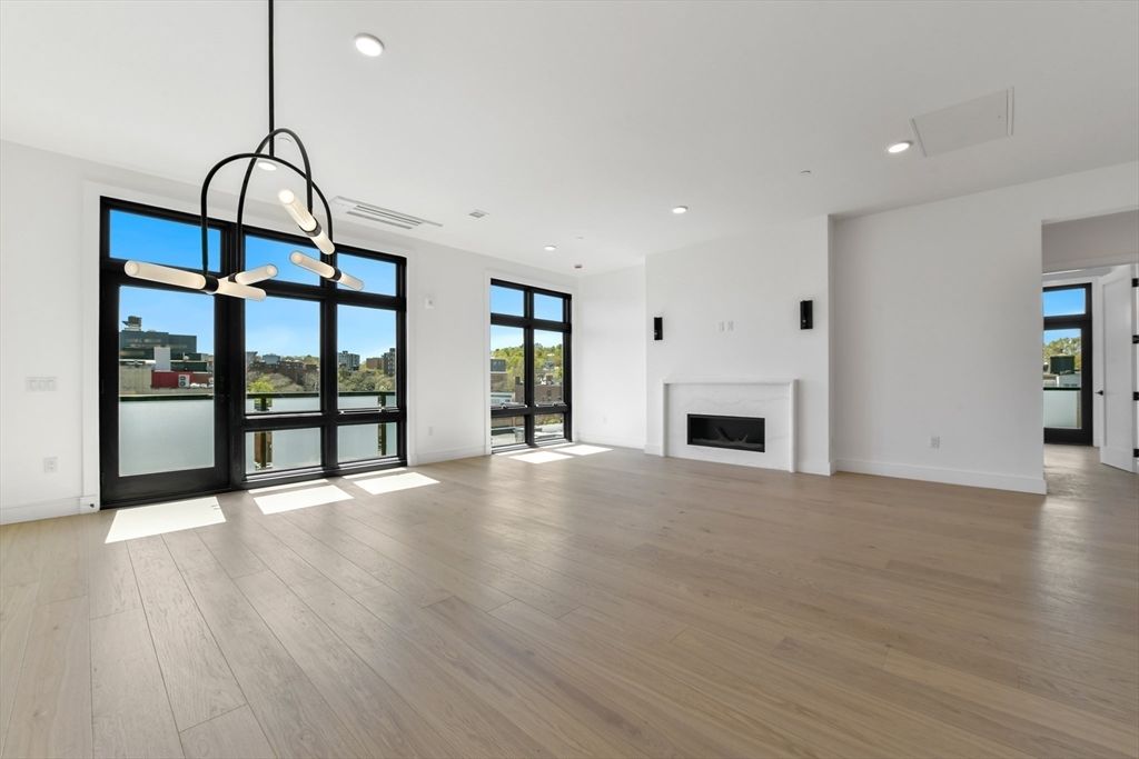 Empty room, Fireplace, Interior, Pendant Lights, Recessed Lighting, Wood Texture Flooring