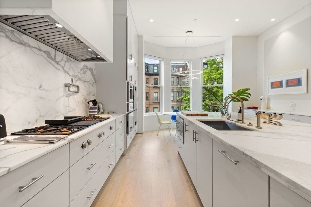 Interior, Kitchen, Marble Walls, Pendant Lights, Recessed Lighting, Wood Texture Flooring