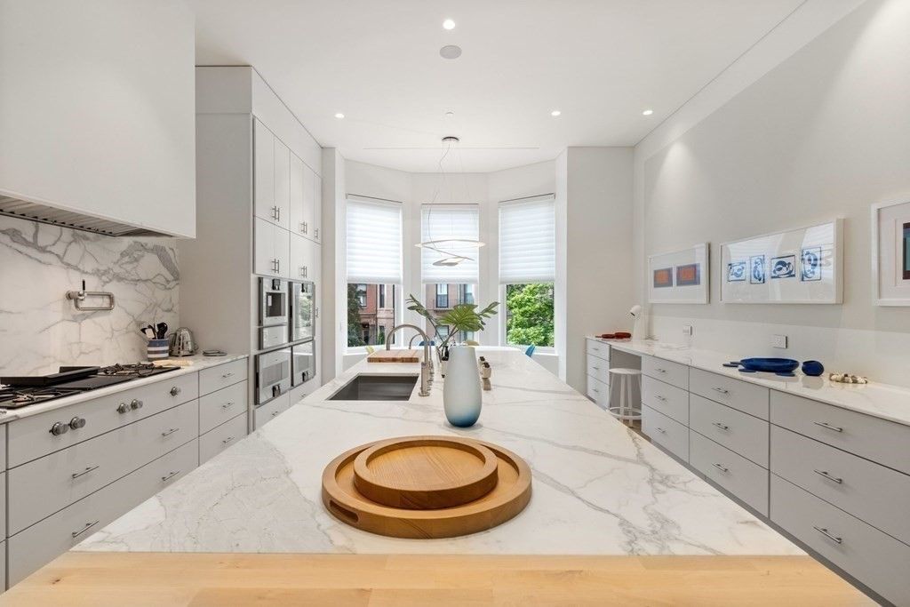 Interior, Kitchen, Marble Walls, Recessed Lighting, Stainless Steel Appliances, Wood Texture Flooring