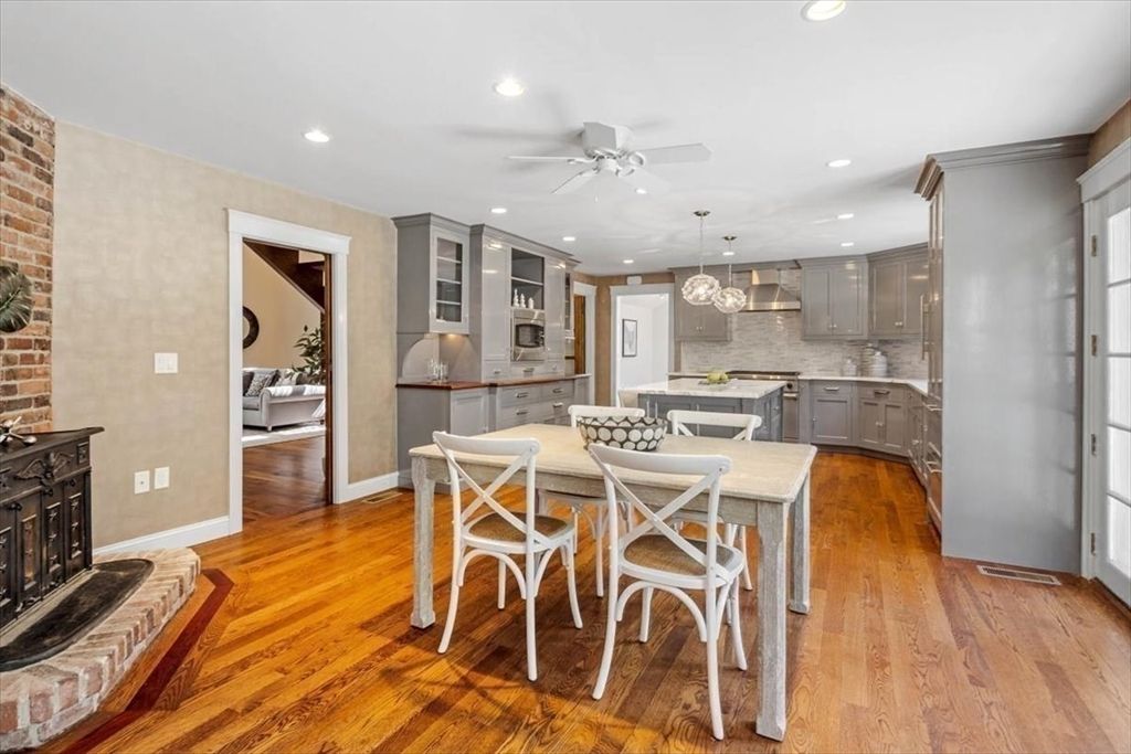 Dining room, Interior, Kitchen, Pendant Lights, Recessed Lighting, Stainless Steel Appliances, Stone Walls, Wood Texture Flooring