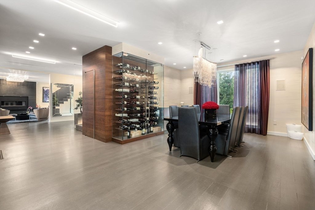 Chandelier, Dining room, Fireplace, Interior, Living room, Recessed Lighting, Wine Storage, Wood Texture Flooring