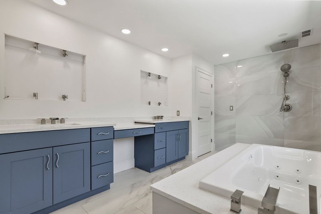 Bathroom, Dual Sink Vanities, Interior, Marble, Marble Walls, Recessed Lighting