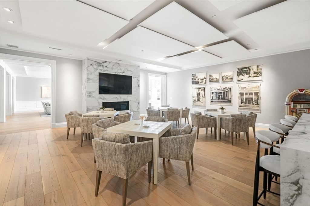 Dining room, Fireplace, Interior, Living room, Marble Walls, Recessed Lighting, Wood Texture Flooring