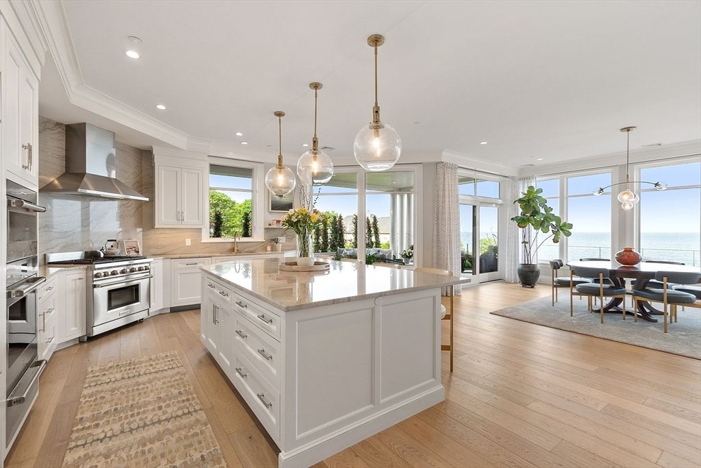 Dining room, Interior, Kitchen, Pendant Lights, Recessed Lighting, Stainless Steel Appliances, Water, Wood Texture Flooring