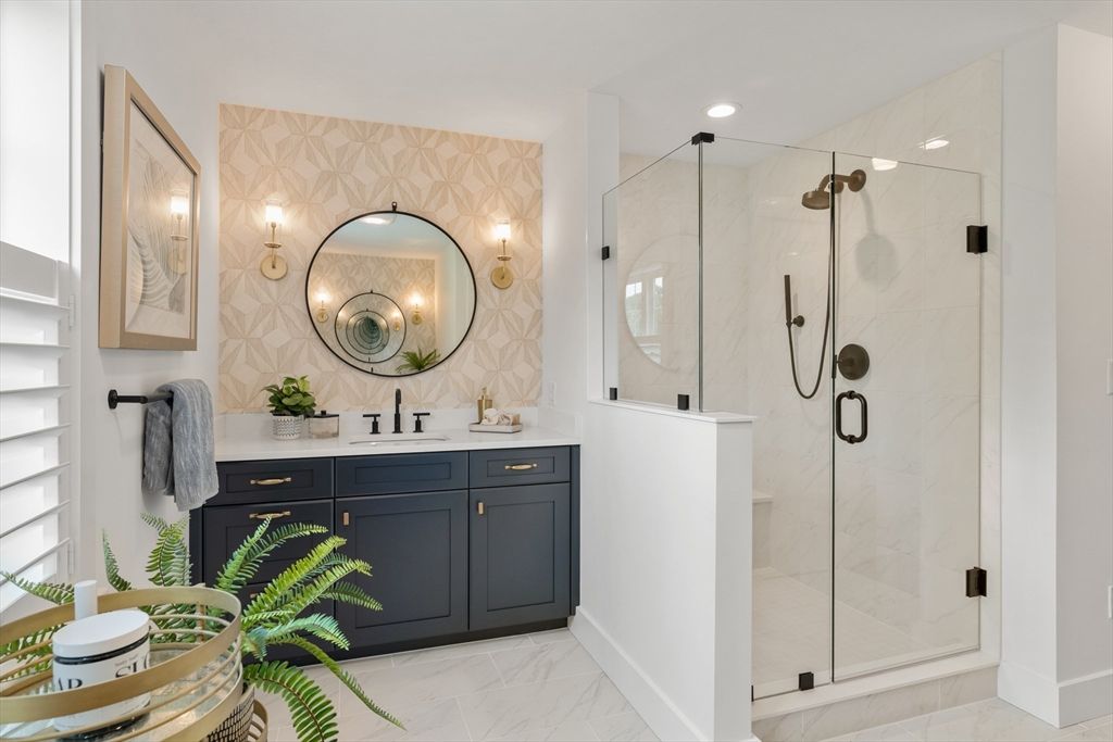 Bathroom, Dual Sink Vanities, Glass Shower, Interior, Marble, Marble Walls, Recessed Lighting