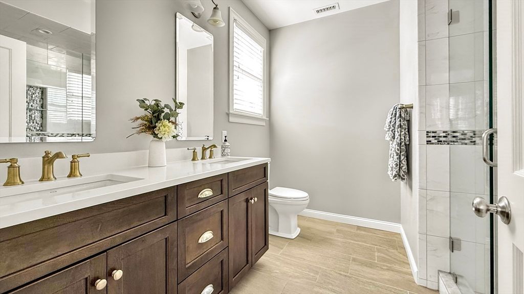 Bathroom, Dual Sink Vanities, Glass Shower, Interior, Wood Texture Flooring