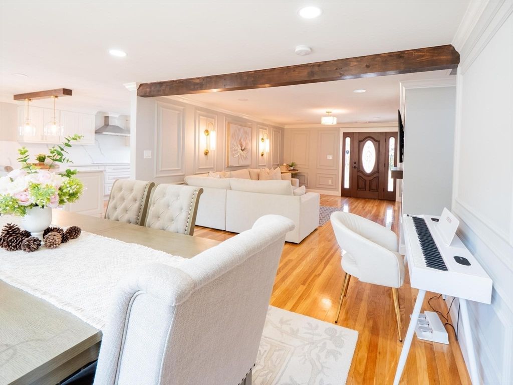 Dining room, Interior, Living room, Pendant Lights, Piano, Recessed Lighting, Wooden Beams, Wood Texture Flooring