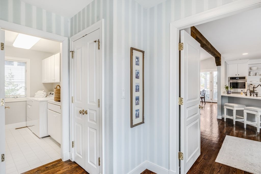 Interior, Kitchen, Recessed Lighting, Washer, Wood Texture Flooring
