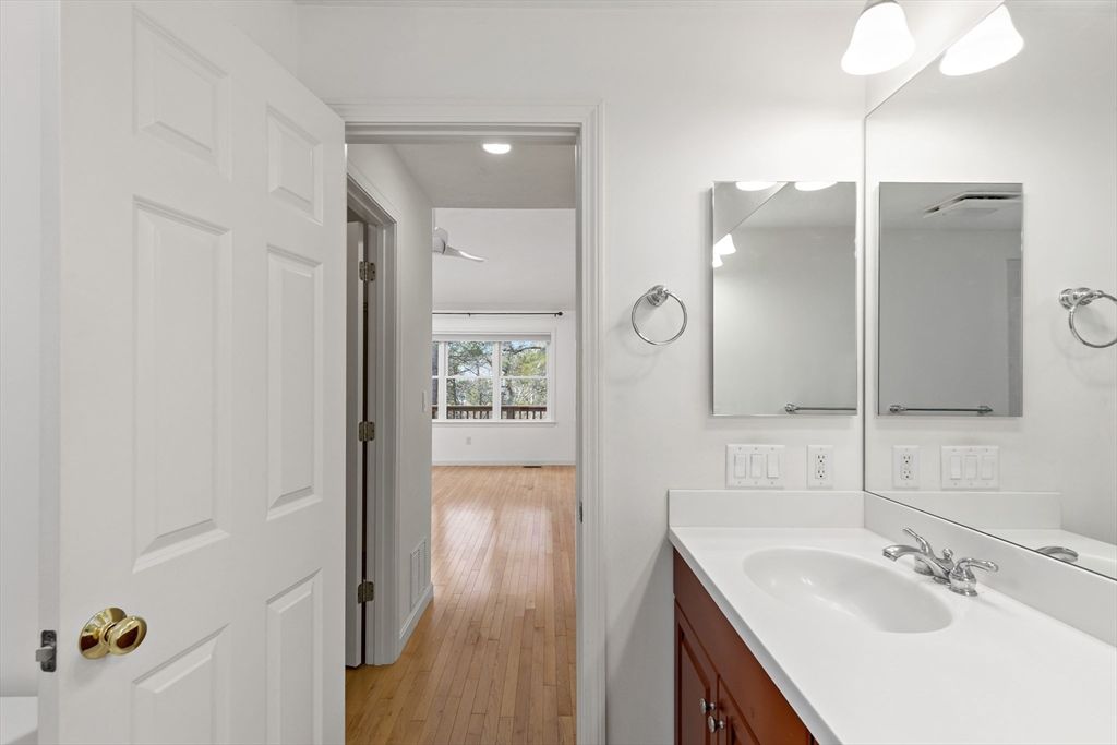 Bathroom, Dual Sink Vanities, Interior, Recessed Lighting, Wood Texture Flooring