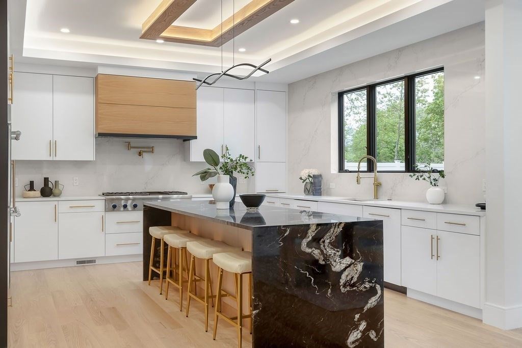 Interior, Kitchen, Marble Walls, Pendant Lights, Recessed Lighting, Stainless Steel Appliances, Wood Texture Flooring