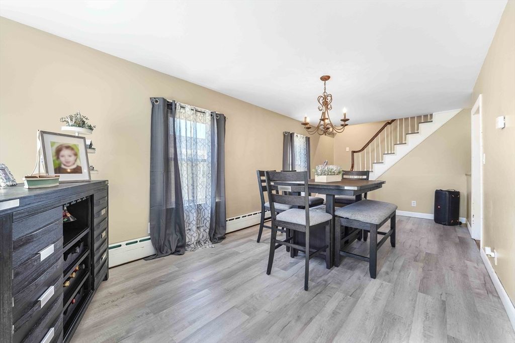Chandelier, Dining room, Interior, Wood Texture Flooring