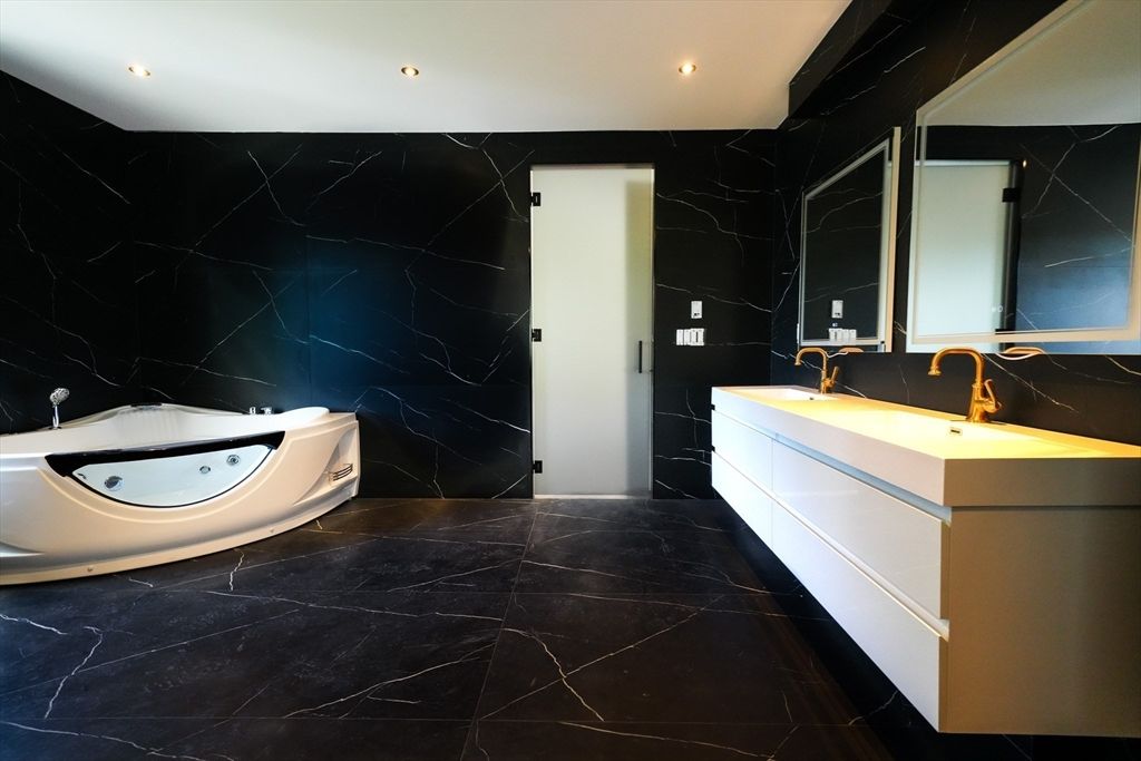 Bathroom, Dual Sink Vanities, Interior, Marble, Marble Walls, Recessed Lighting