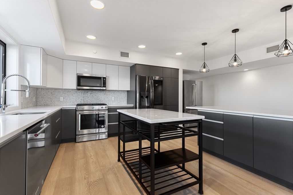 Interior, Kitchen, Pendant Lights, Recessed Lighting, Stainless Steel Appliances, Wood Texture Flooring