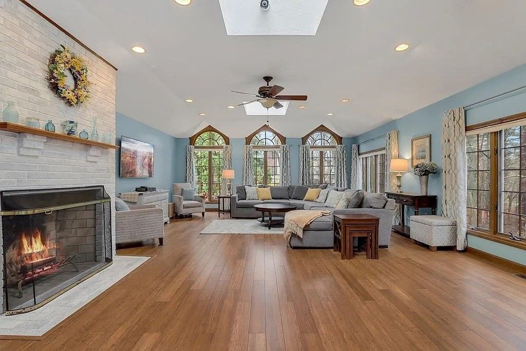 Fireplace, Interior, Living room, Recessed Lighting, Stone Walls, Wood Texture Flooring