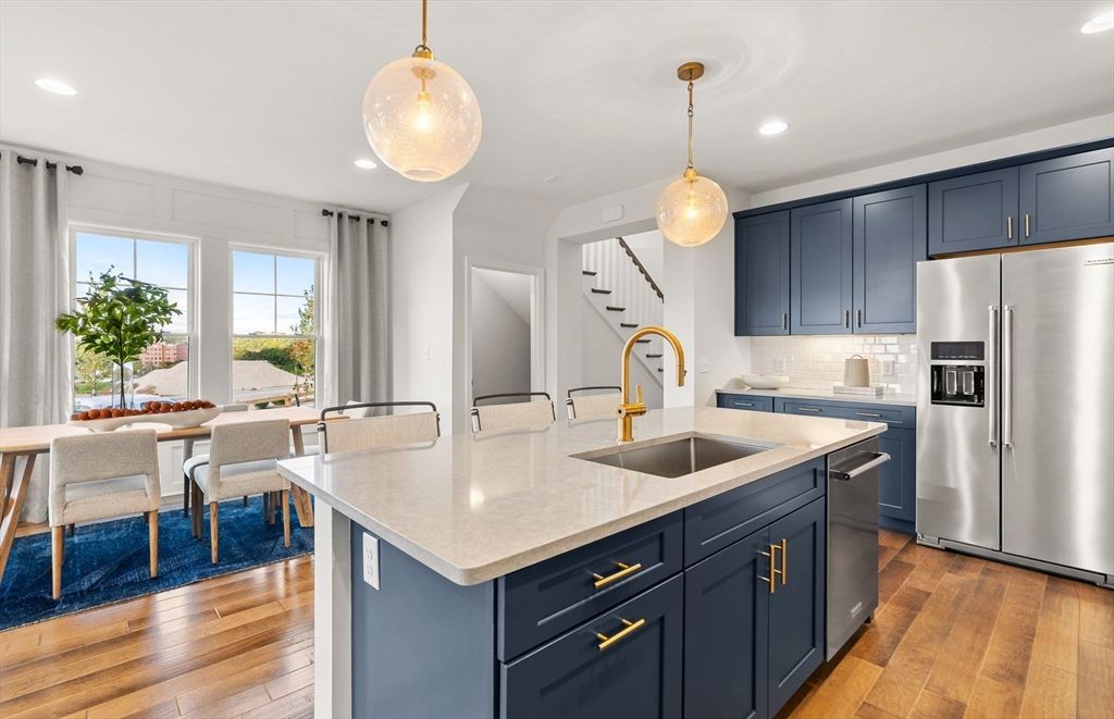 Dining room, Interior, Kitchen, Pendant Lights, Recessed Lighting, Stainless Steel Appliances, Wood Texture Flooring