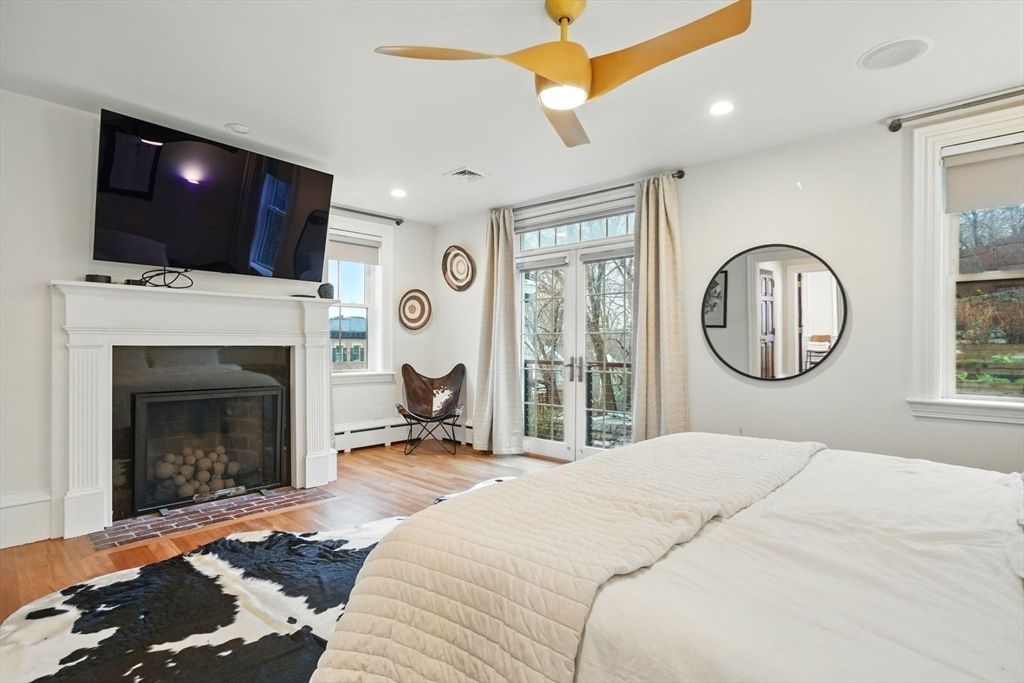 Bedroom, Fireplace, Interior, Recessed Lighting, Wood Texture Flooring