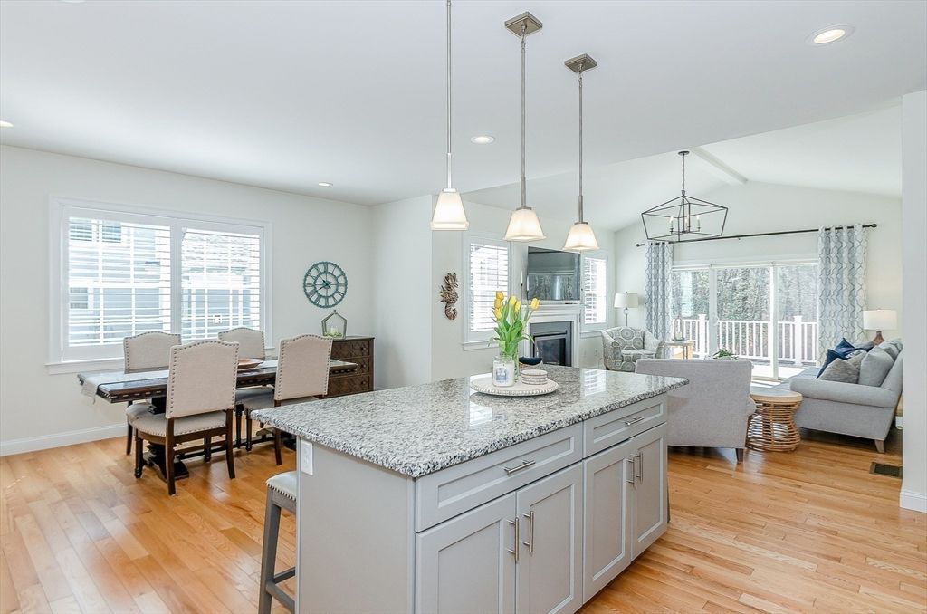 Dining room, Fireplace, Interior, Living room, Pendant Lights, Recessed Lighting, Wood Texture Flooring