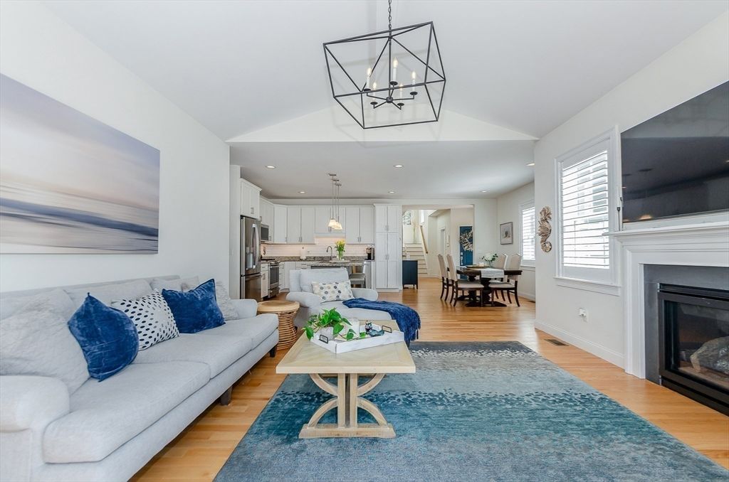 Dining room, Fireplace, Interior, Kitchen, Living room, Pendant Lights, Recessed Lighting, Stainless Steel Appliances, Wood Texture Flooring