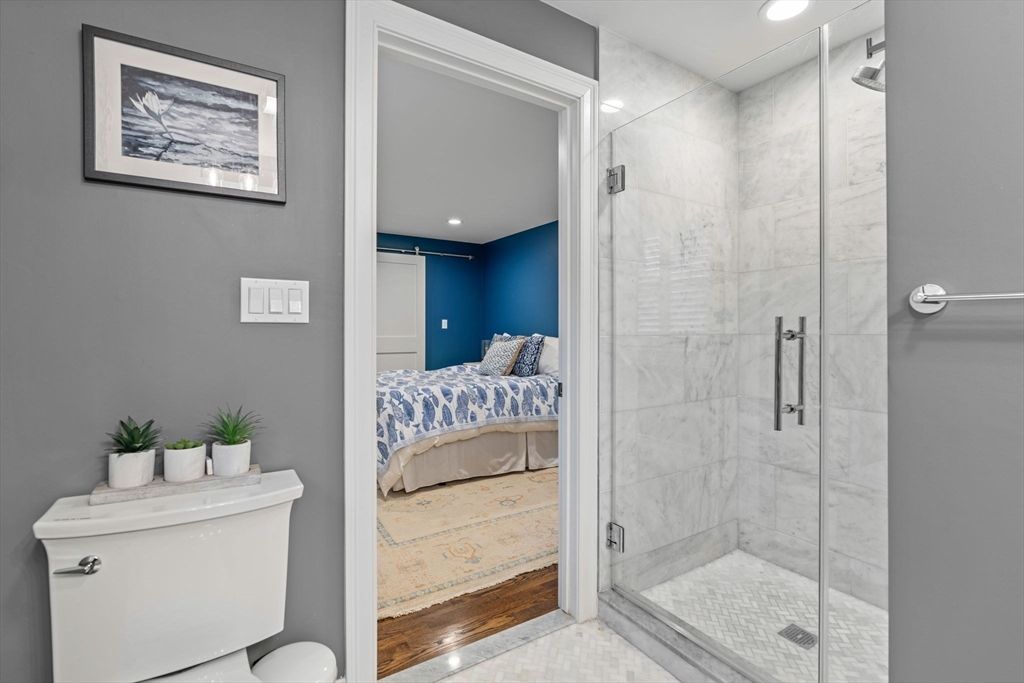 Bathroom, Bedroom, Glass Shower, Interior, Marble Walls, Recessed Lighting, Wood Texture Flooring