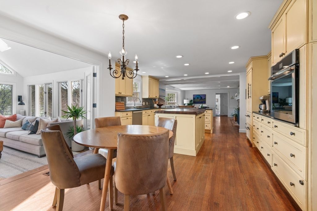 Chandelier, Dining room, Interior, Kitchen, Living room, Recessed Lighting, Stainless Steel Appliances, Wood Texture Flooring
