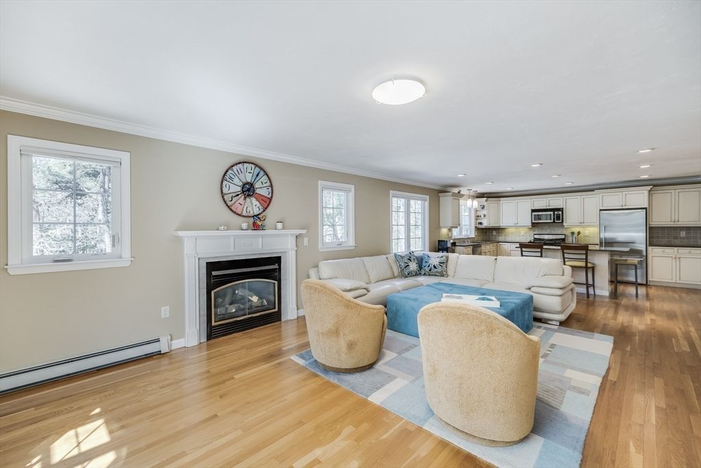 Fireplace, Interior, Kitchen, Living room, Recessed Lighting, Stainless Steel Appliances, Wood Texture Flooring