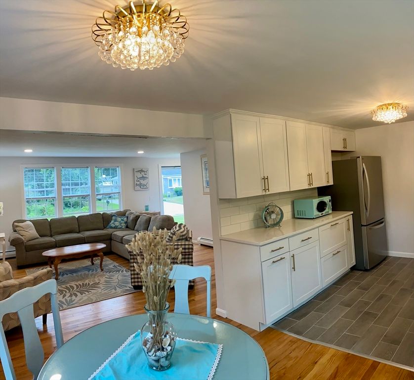 Chandelier, Interior, Kitchen, Living room, Recessed Lighting, Wood Texture Flooring
