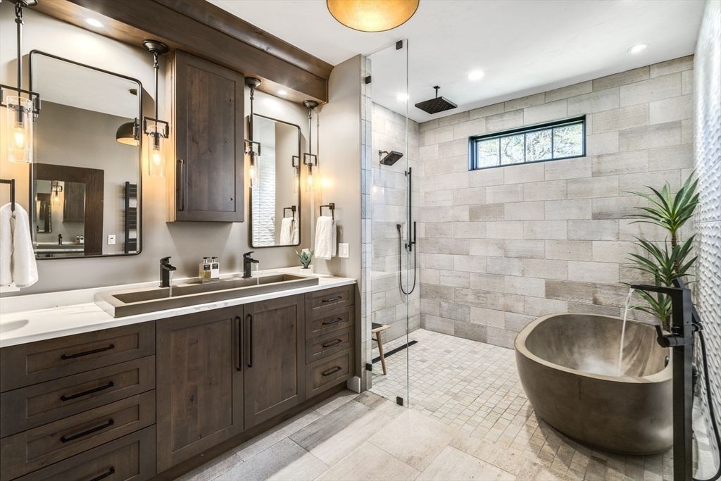 Bathroom, Dual Sink Vanities, Free Standing Baths, Glass Shower, Interior, Pendant Lights, Recessed Lighting, Stone Walls