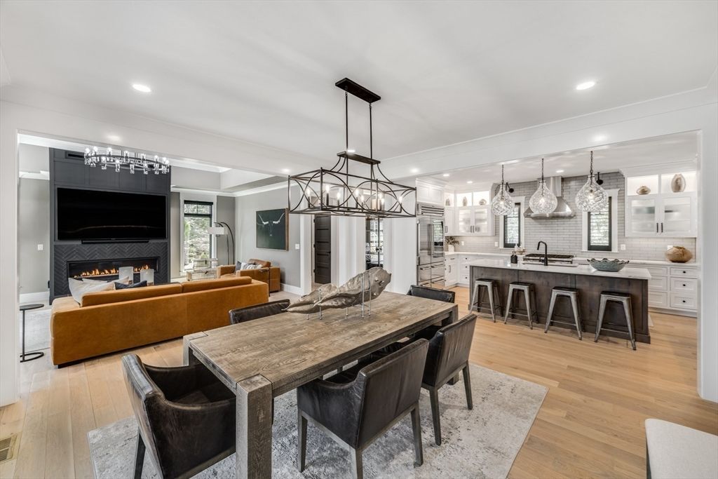 Dining room, Fireplace, Interior, Kitchen, Living room, Pendant Lights, Recessed Lighting, Stainless Steel Appliances, Wood Texture Flooring