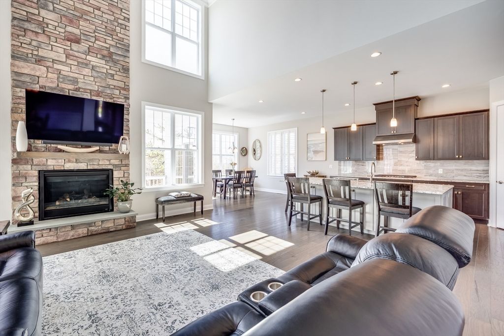Dining room, Fireplace, Interior, Kitchen, Living room, Pendant Lights, Recessed Lighting, Stone Walls, Wood Texture Flooring