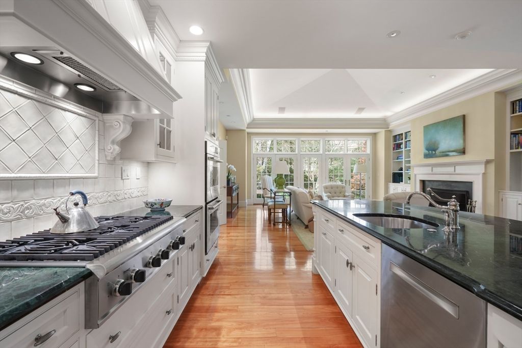 Dining room, Fireplace, Interior, Kitchen, Living room, Recessed Lighting, Stainless Steel Appliances, Wood Texture Flooring