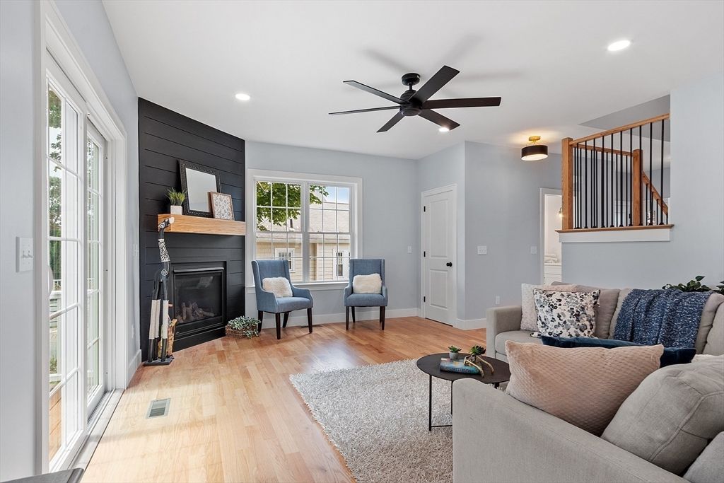 Fireplace, Interior, Living room, Recessed Lighting, Wood Texture Flooring