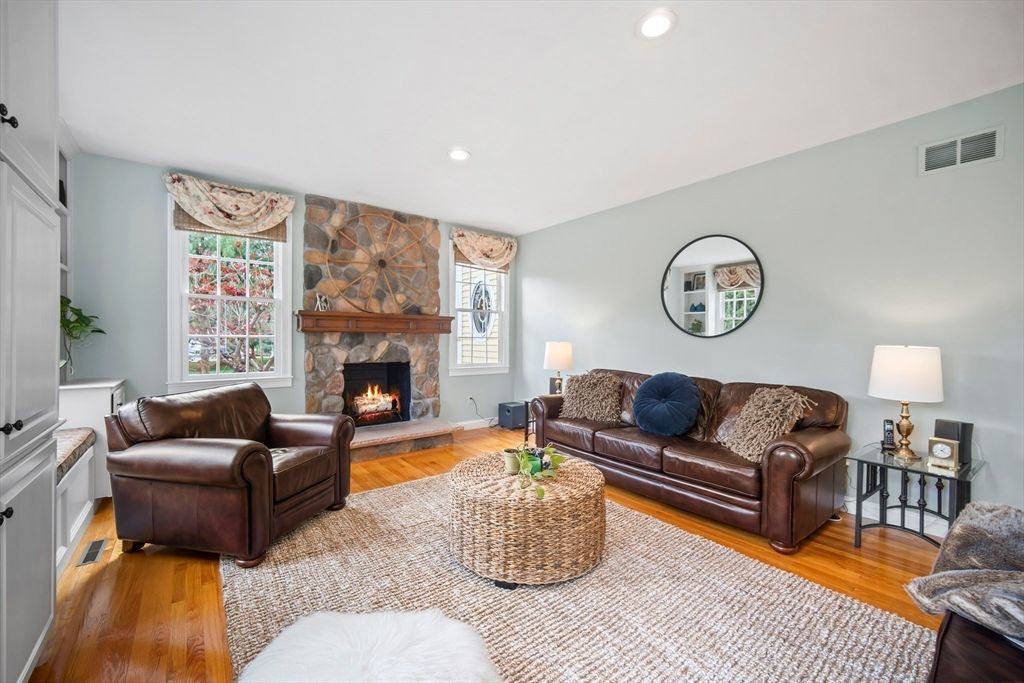 Fireplace, Interior, Living room, Recessed Lighting, Stone Walls, Wood Texture Flooring