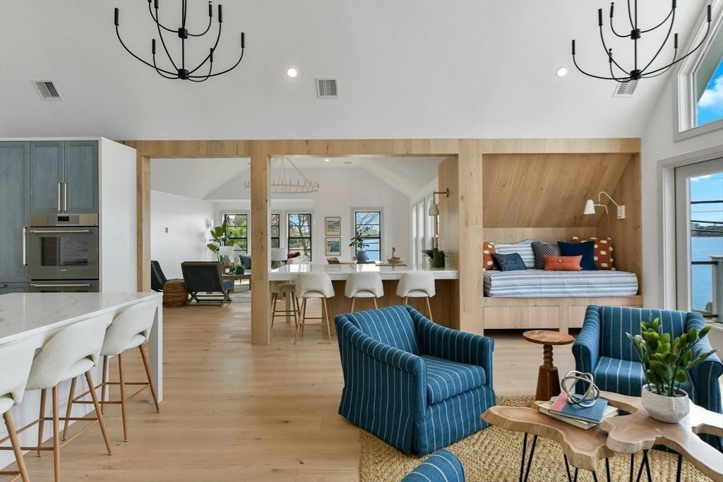 Chandelier, Dining room, Interior, Kitchen, Living room, Recessed Lighting, Water, Wood Texture Flooring