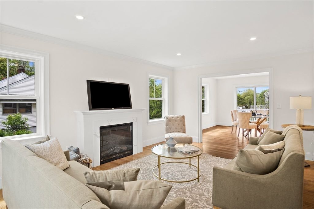 Dining room, Fireplace, Interior, Living room, Recessed Lighting, Wood Texture Flooring