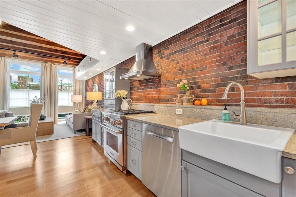Interior, Kitchen, Living room, Recessed Lighting, Stainless Steel Appliances, Stone Walls, Wooden Beams, Wood Texture Flooring