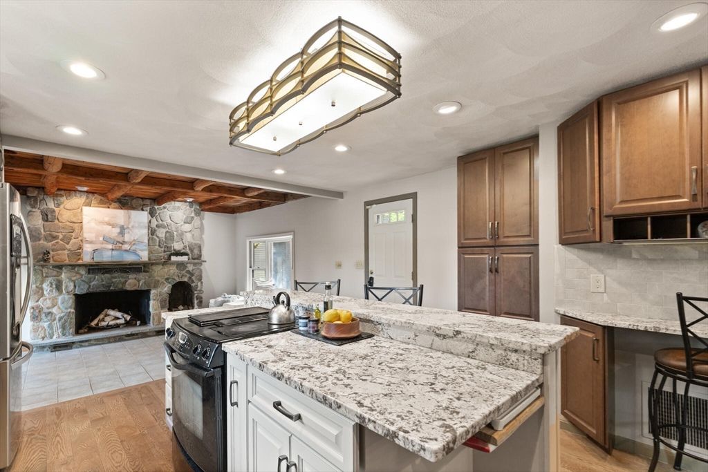 Fireplace, Interior, Kitchen, Recessed Lighting, Stone Walls, Wood Texture Flooring