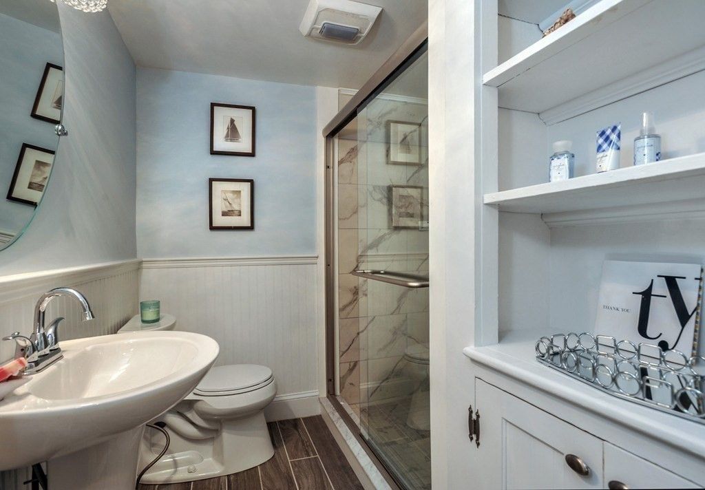 Bathroom, Glass Shower, Interior, Marble Walls, Wood Texture Flooring