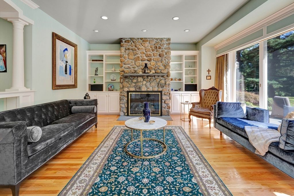 Fireplace, Interior, Living room, Recessed Lighting, Stone Walls, Wood Texture Flooring