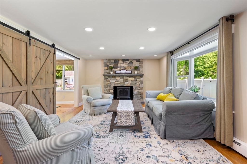 Fireplace, Interior, Living room, Recessed Lighting, Stone Walls, Wood Texture Flooring