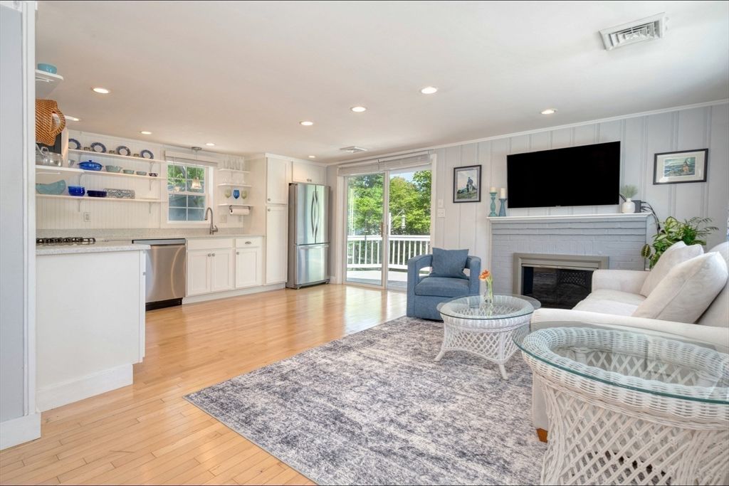 Fireplace, Interior, Kitchen, Living room, Recessed Lighting, Stainless Steel Appliances, Wood Texture Flooring