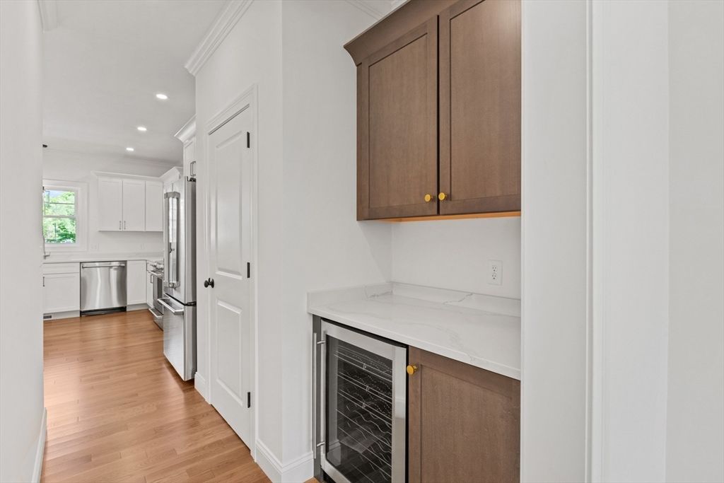 Fireplace, Interior, Kitchen, Recessed Lighting, Stainless Steel Appliances, Wood Texture Flooring