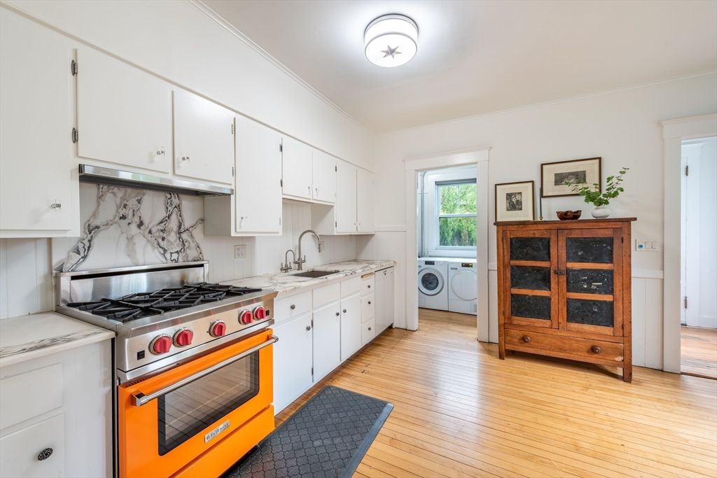 Interior, Kitchen, Marble Walls, Washer, Wood Texture Flooring