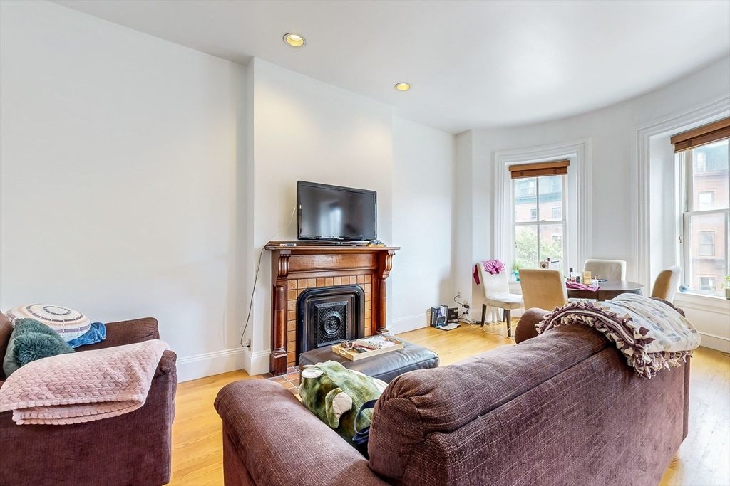 Dining room, Fireplace, Interior, Living room, Recessed Lighting, Wood Texture Flooring