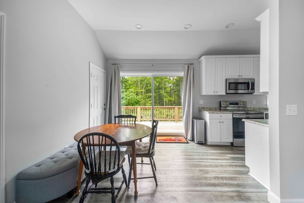 Dining room, Interior, Kitchen, Recessed Lighting, Stainless Steel Appliances, Wood Texture Flooring