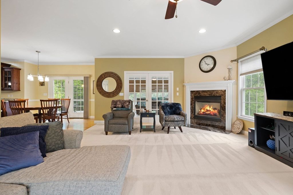 Dining room, Fireplace, Interior, Living room, Pendant Lights, Recessed Lighting, Wood Texture Flooring