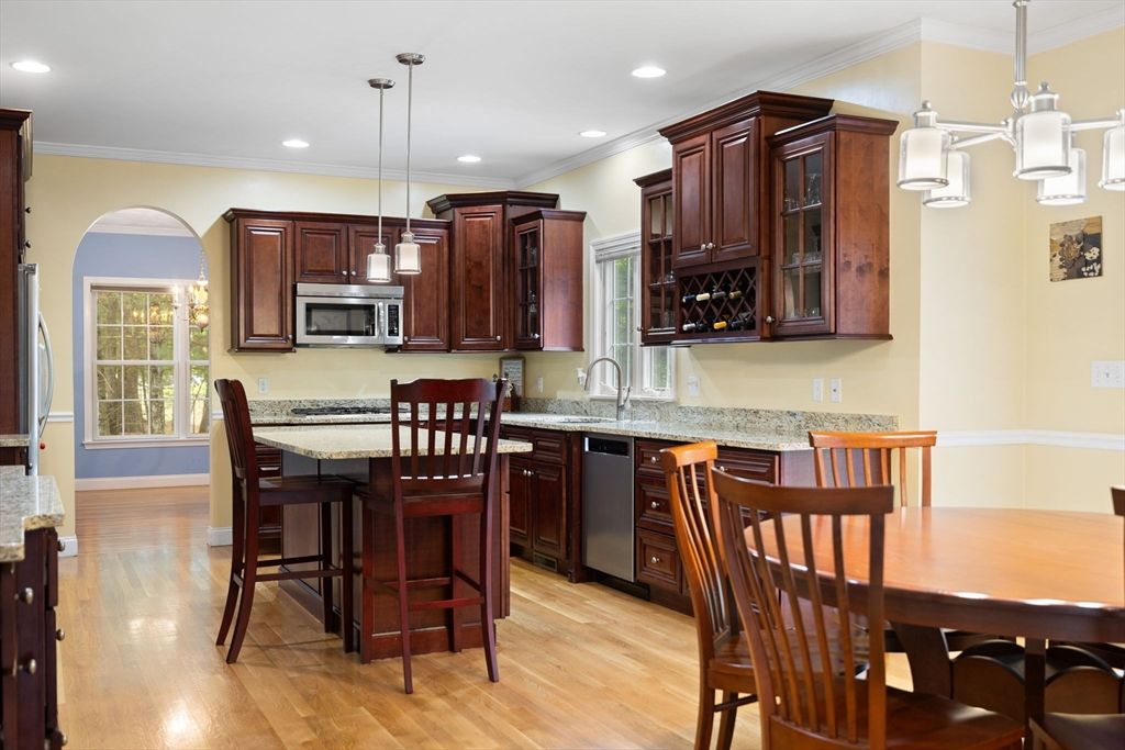 Dining room, Interior, Kitchen, Pendant Lights, Recessed Lighting, Stainless Steel Appliances, Wood Texture Flooring