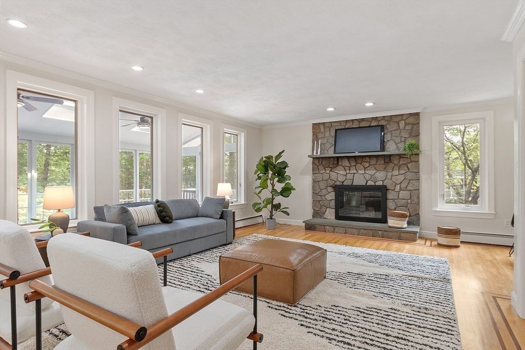 Fireplace, Interior, Living room, Recessed Lighting, Stone Walls, Wood Texture Flooring