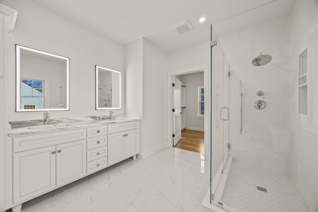 Bathroom, Dual Sink Vanities, Glass Shower, Interior, Marble, Recessed Lighting, Wood Texture Flooring