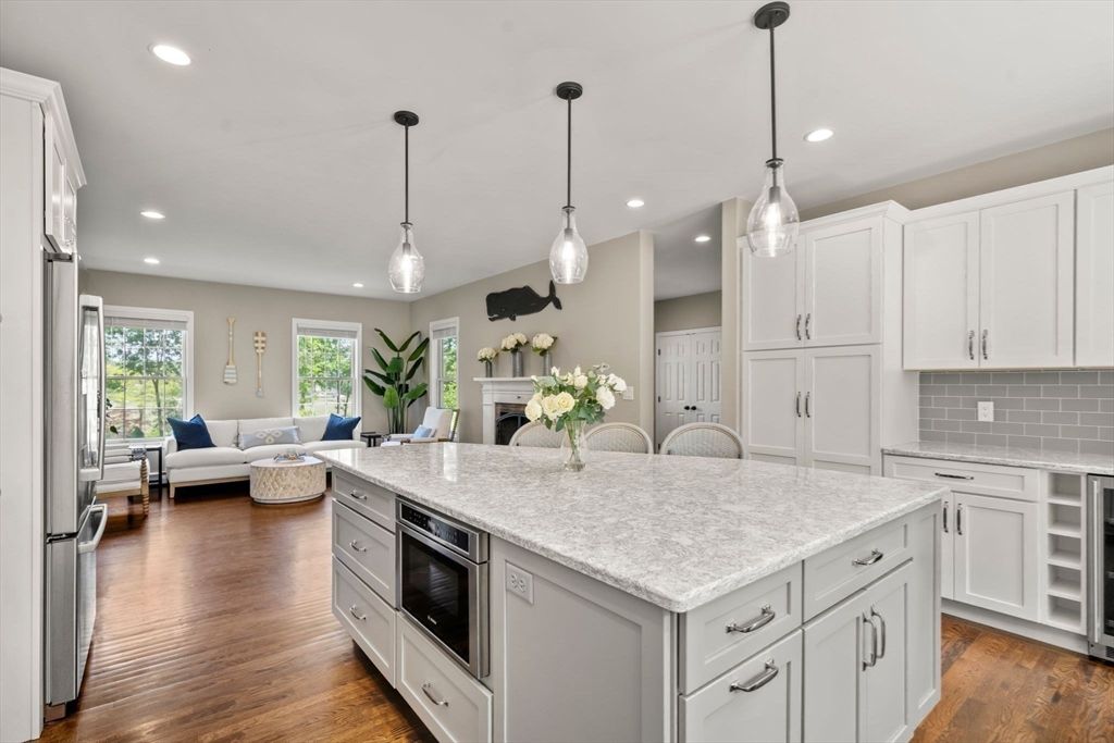 Fireplace, Interior, Kitchen, Living room, Pendant Lights, Recessed Lighting, Stainless Steel Appliances, Wood Texture Flooring